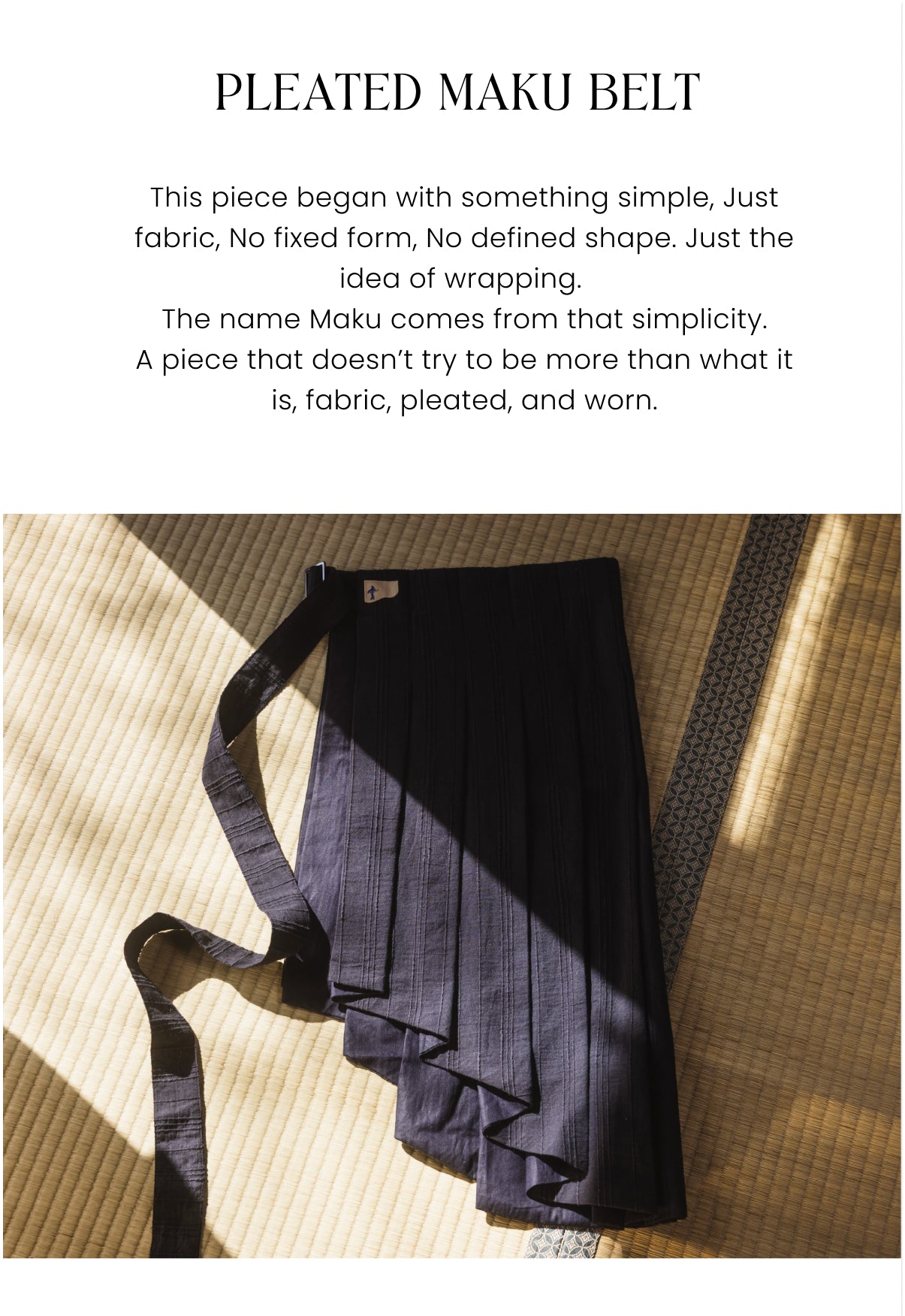This is a Slooplife Pleated Maku Belt skirt in navy.